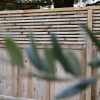 Slatted Panels installed above a Heavy Duty Solid Fence