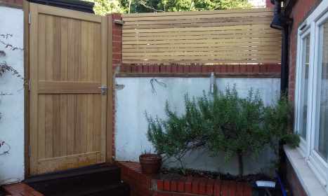 Tongue and groove gate with slatted panels
