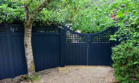Avenue panels, square trellis and bespoke gates, painted in Slate