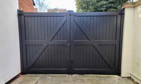 Solid Bespoke Driveway Gates painted in Black