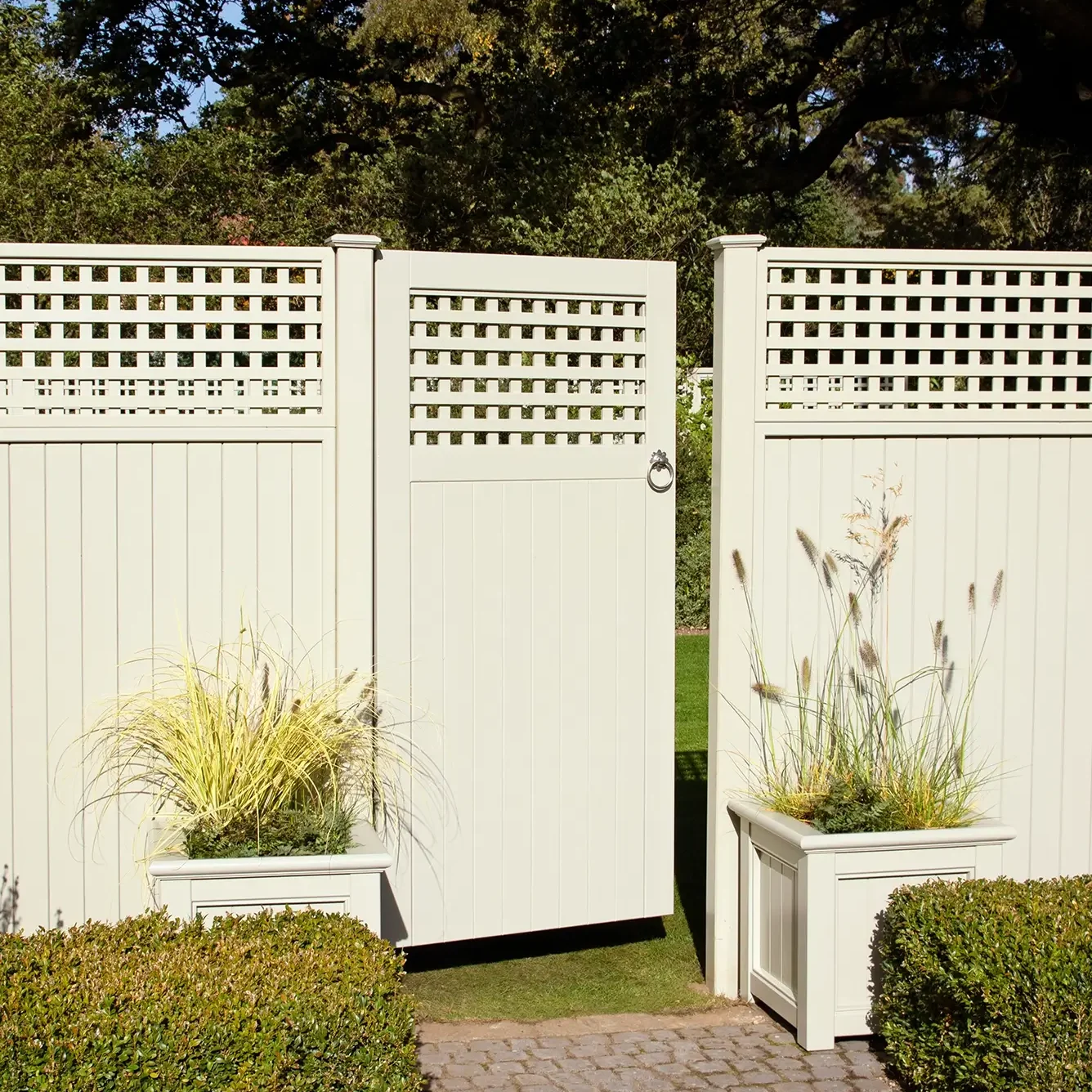 GTC RHS Tongue Grove Fence Panels and Diagonal Trellis Top Gate in Manhattan Grey with Traditional Planters