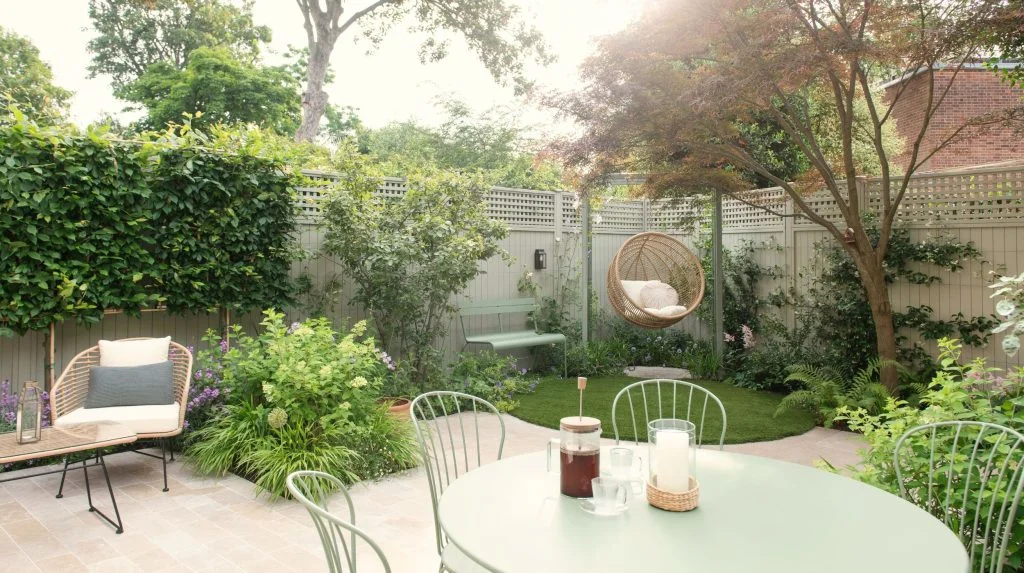 Joanna Archer - RHS Prestige Solid Fence Panels with RHS Prestige Square Trellis (38mm gap) on top painted in Manhattan Grey