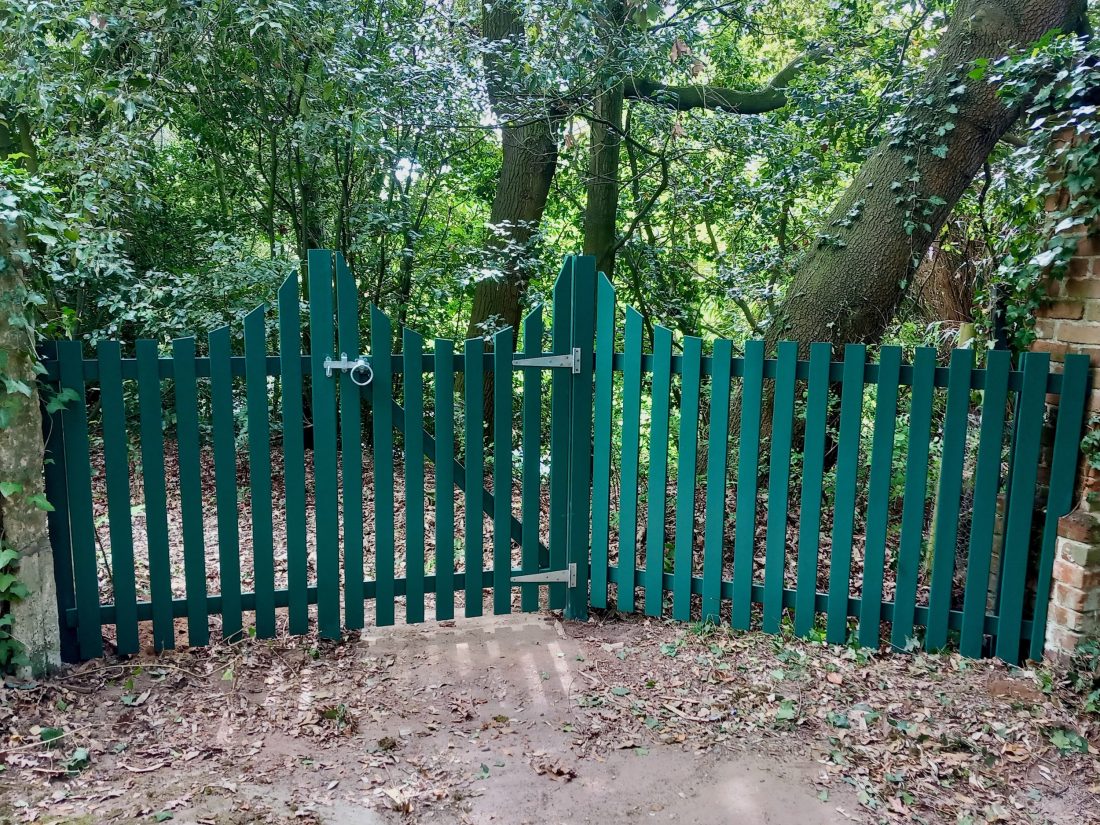 Bespoke picket fence panels and gates, painted in Alpine