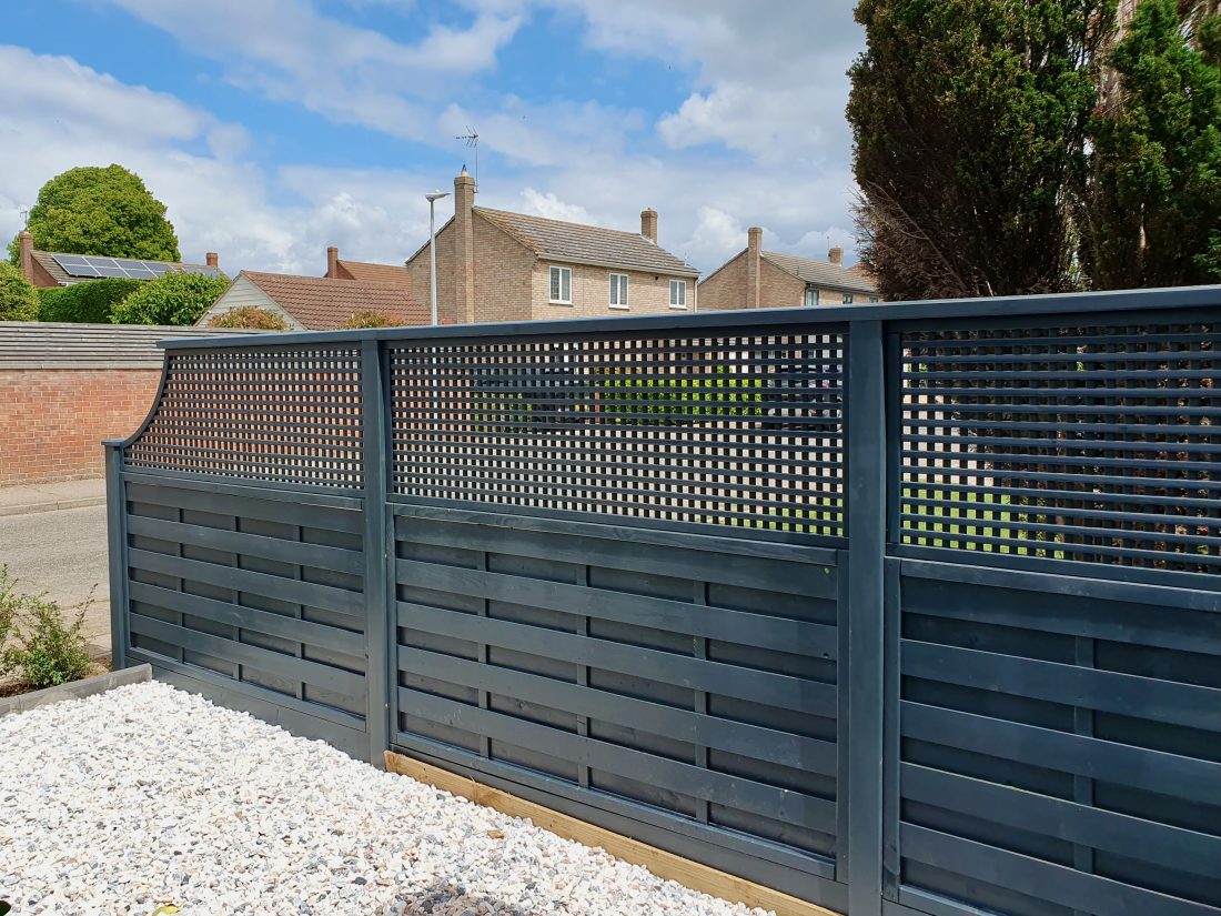 Solid Fence Panels with Square Privacy Panels on the top painted in Charcoal