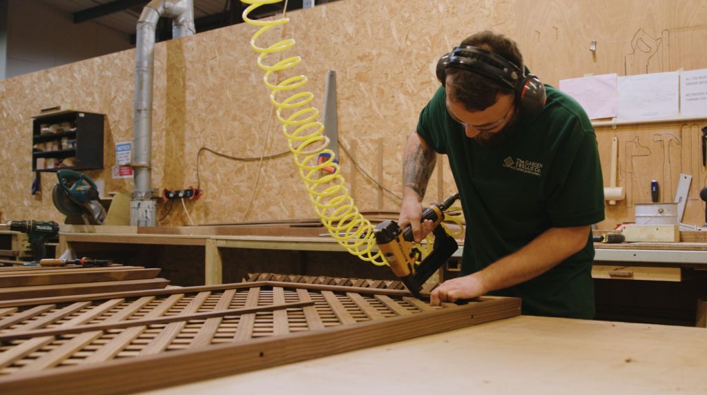 Photo of a man making high quality garden trellis