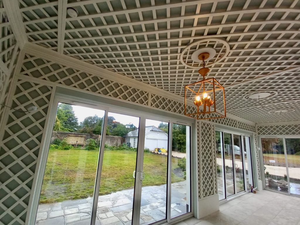 Decorative interior trellis painted in Farrow & Ball Wimborne White
