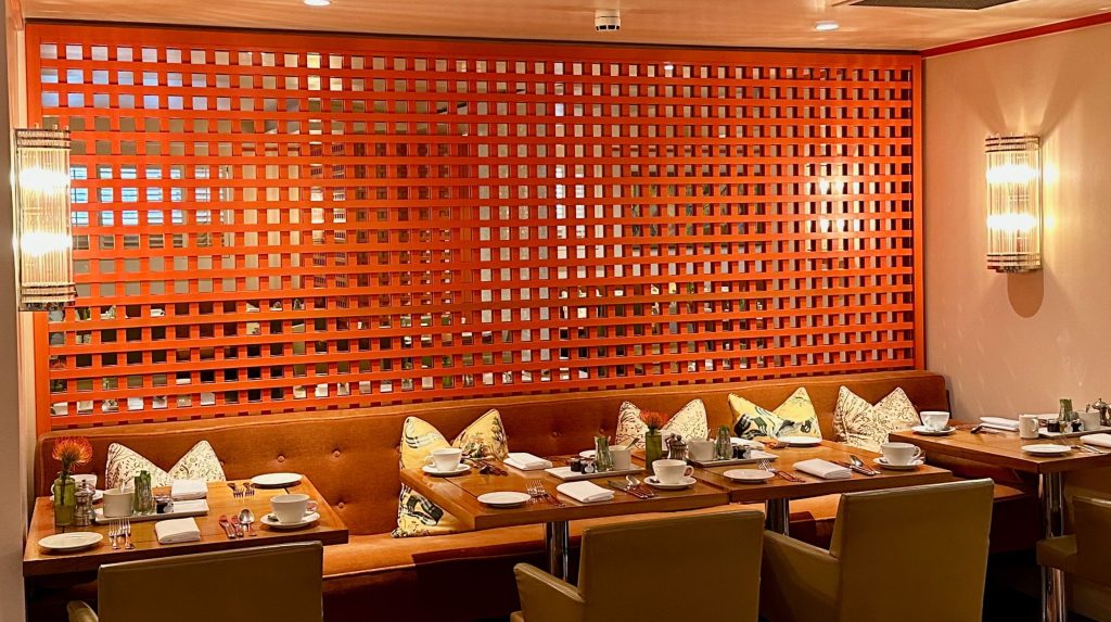 A large mirror-backed trellis panel in the Bloomsbury Hotel