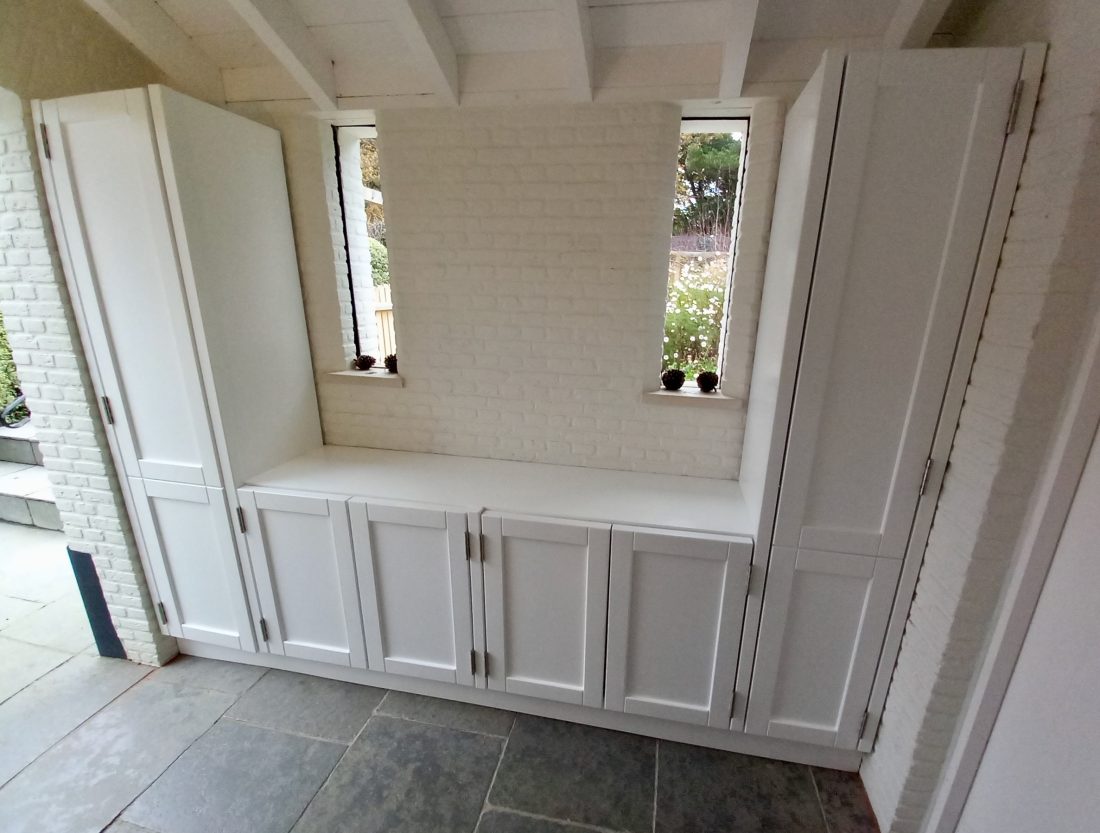 Bespoke boot room storage units painted White