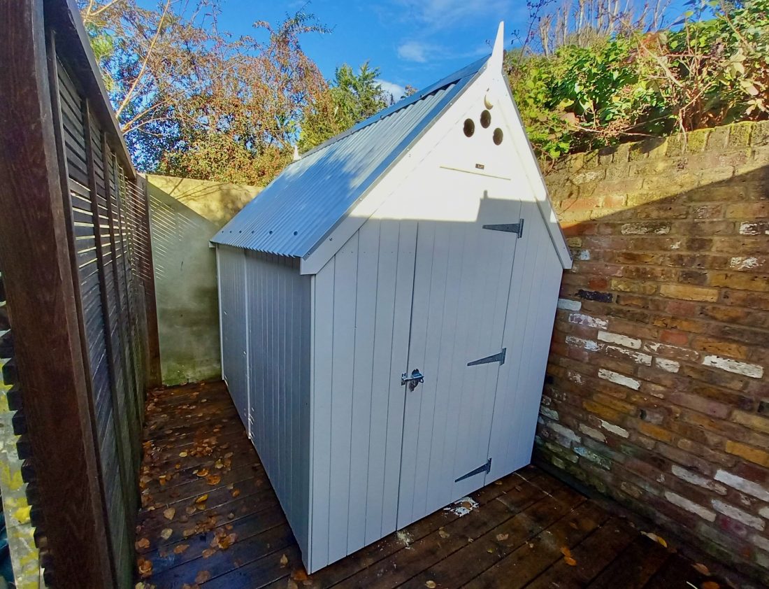 RHS Large Shed in Orford Cream with a tin roof