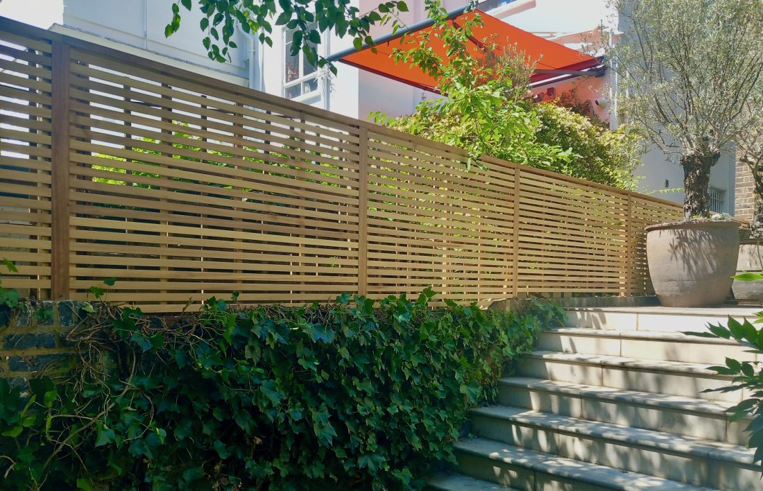 Slatted Fencing (36mm slat:18mm gap) in Iroko