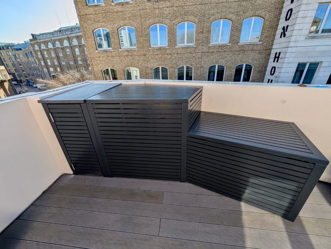 Bespoke slatted covers and storage painted in Off Black