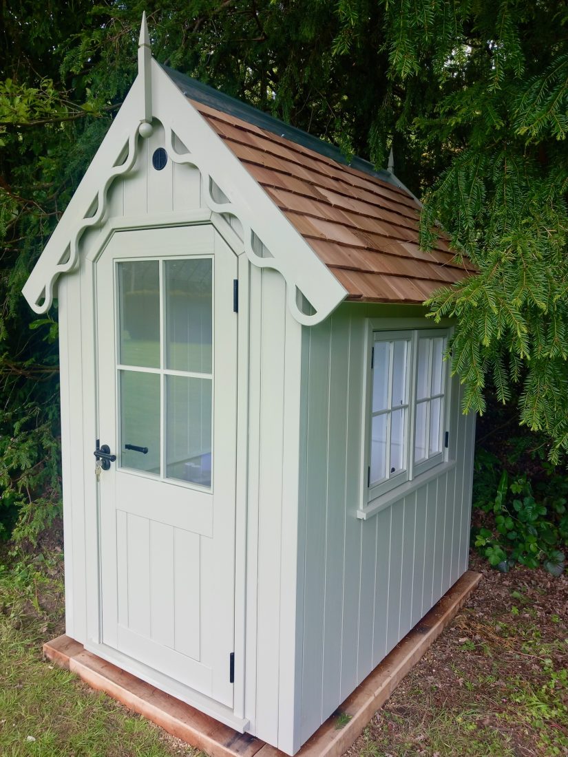 RHS Prestige Victorian Shed – painted in Manhattan Grey with Cedar Shingle Roof