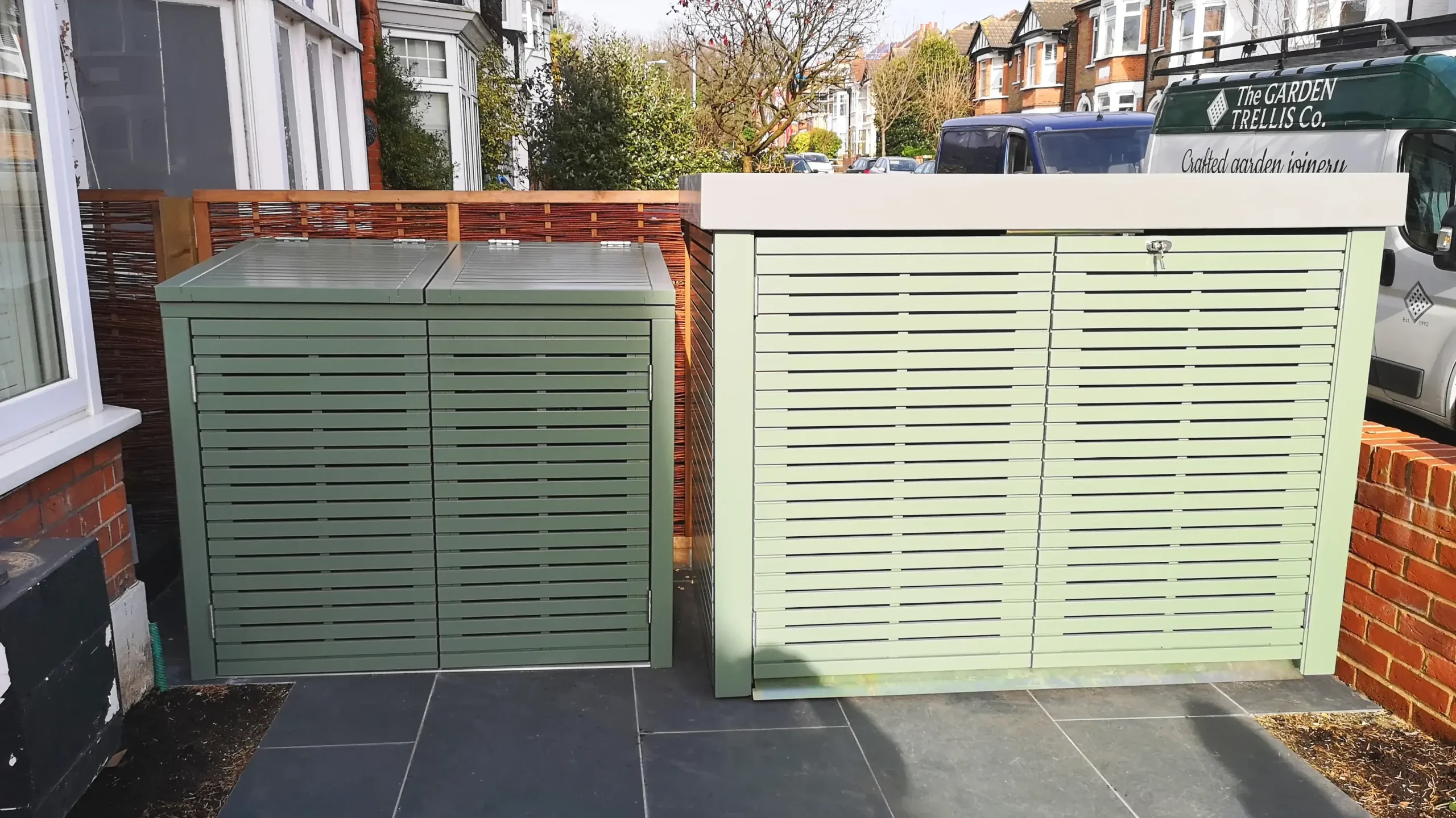 Prestige Contemporary Bike Shed and Prestige Slatted Bin Store painted Gorse Green