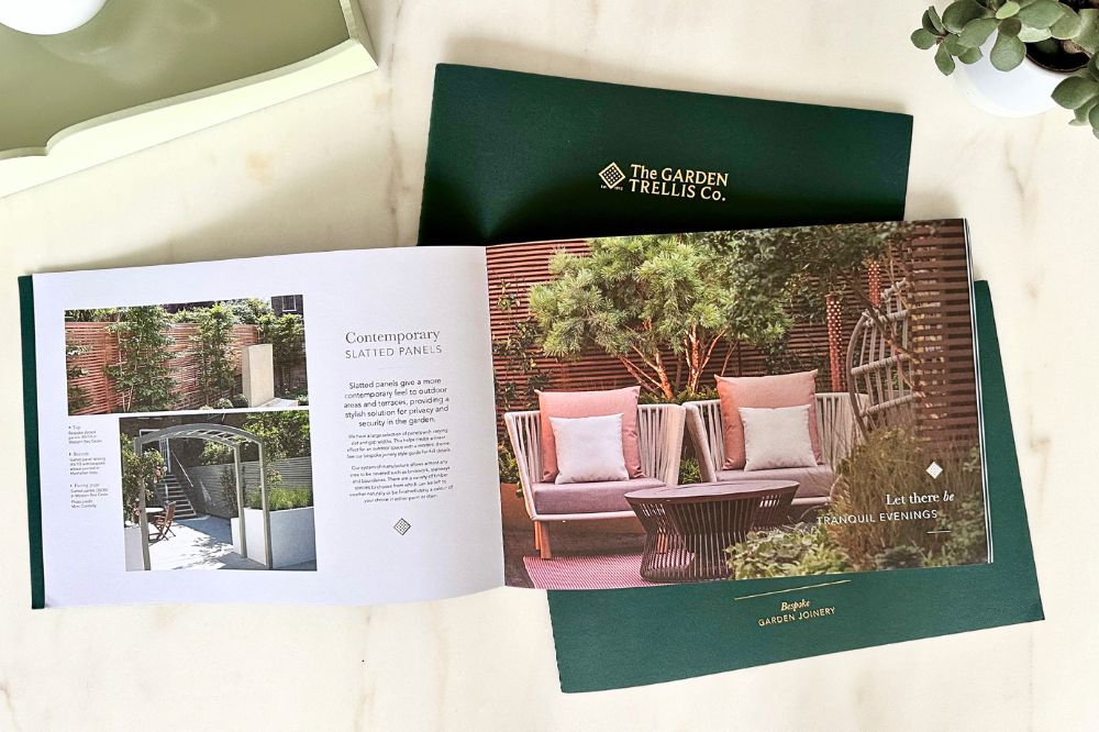 The Garden Trellis Co Bespoke Brochures on a marble background