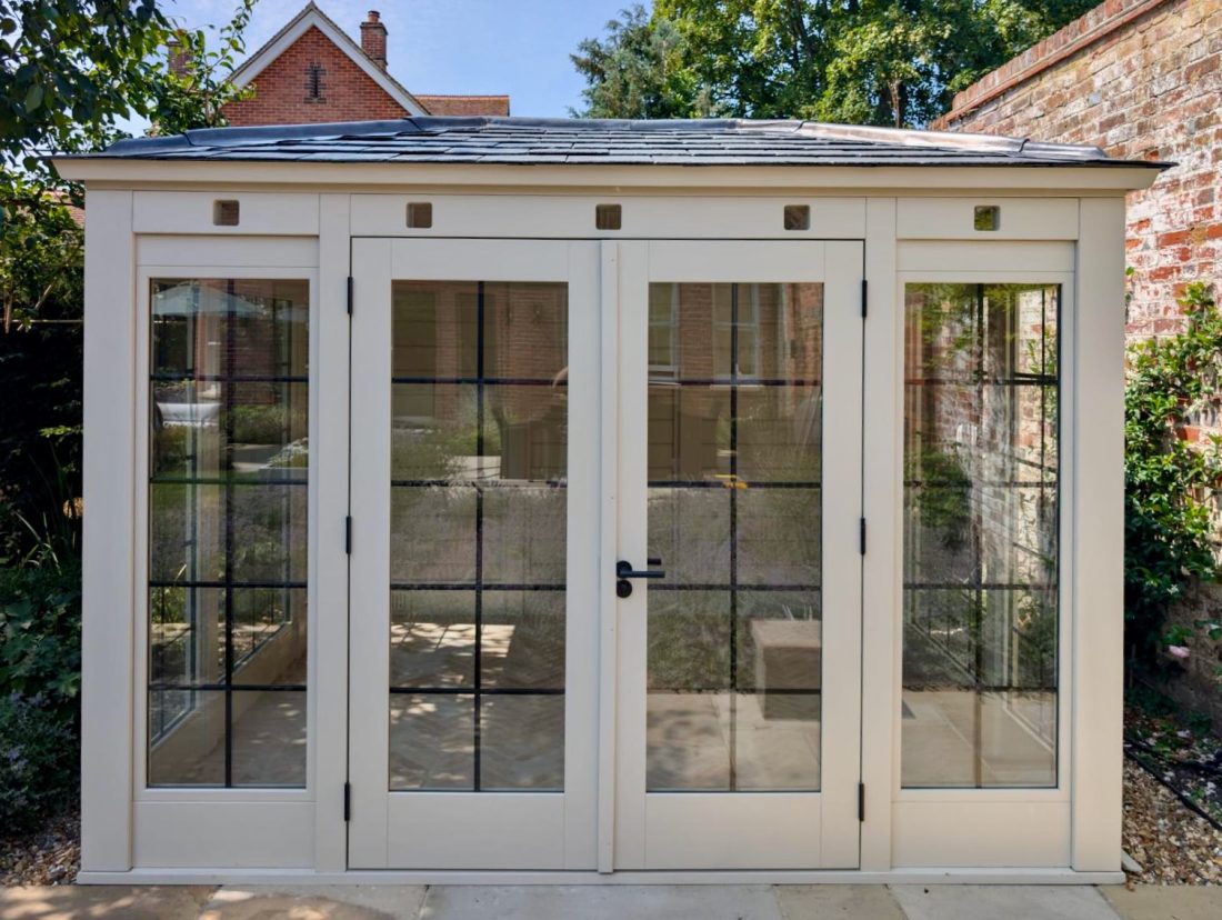 Bespoke summer house with slate tiles and square glazing