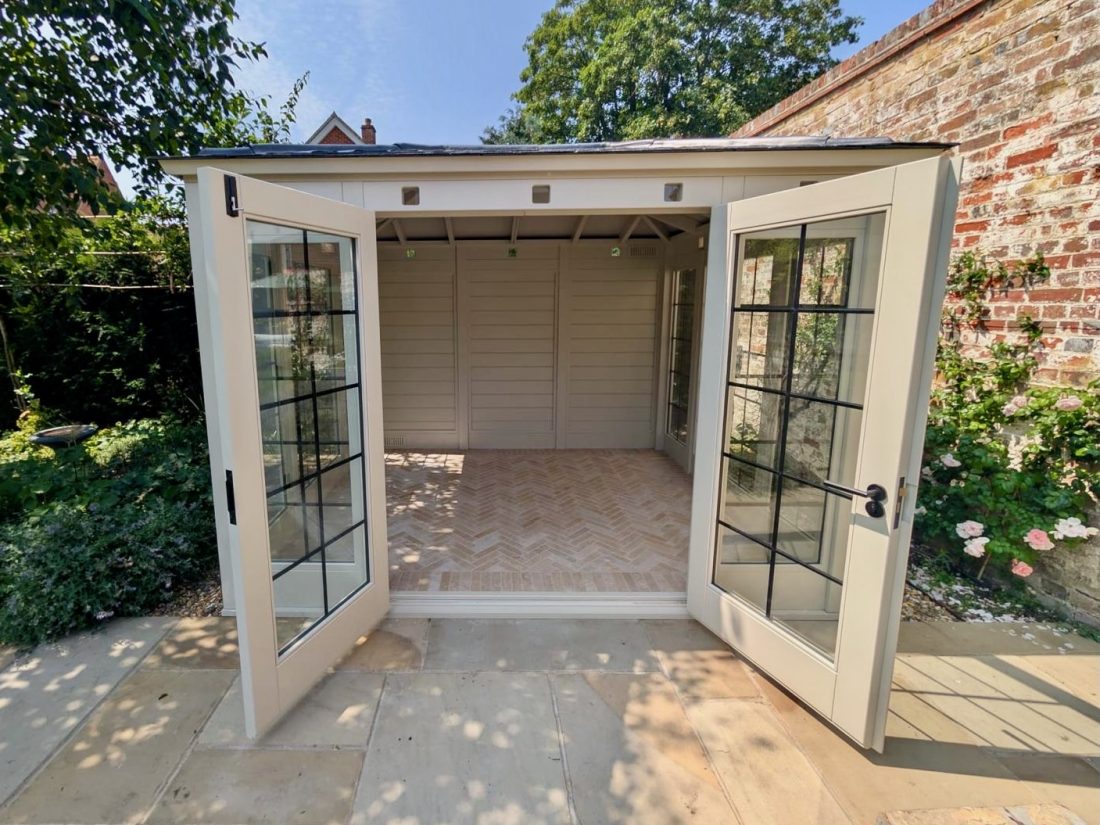 Bespoke summer house with slate tiles and square glazing