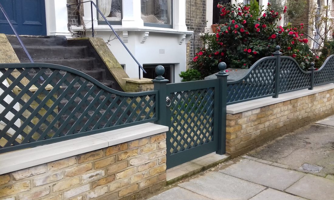 Bespoke trellis gate and curved trellis in a front garden